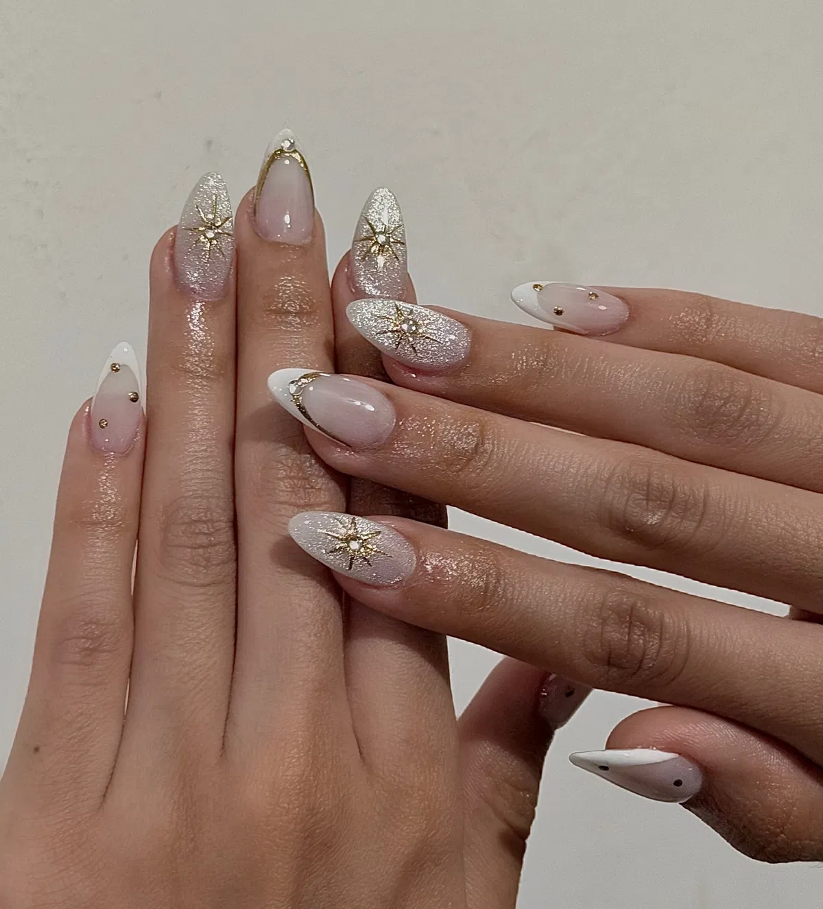 Coordinated starbursts and gold-studded French tips