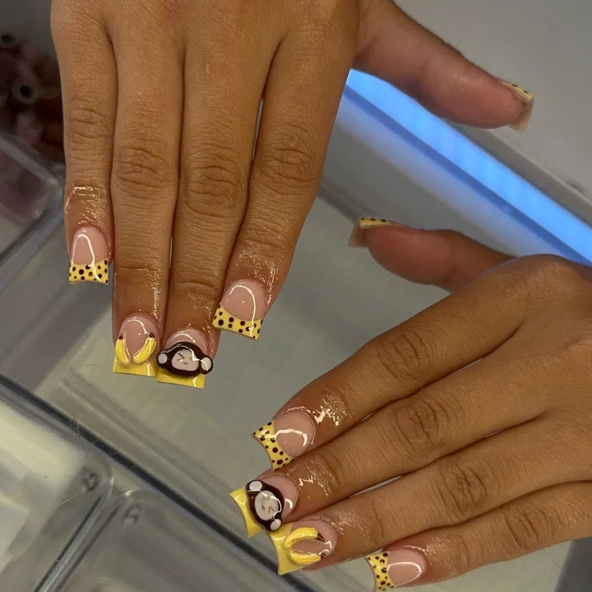 Yellow polka-dot tips with raised monkey and banana designs