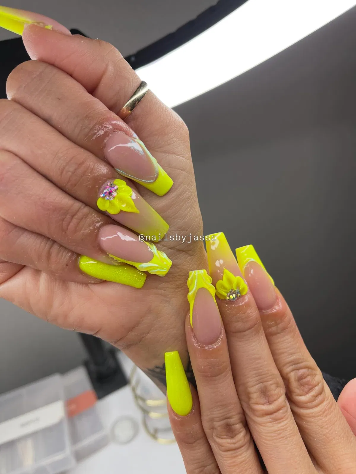 Neon yellow tips with 3D flowers and rhinestone accents