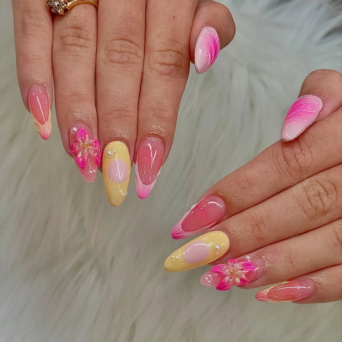 Long pointed pink-and-yellow set with 3D floral accents