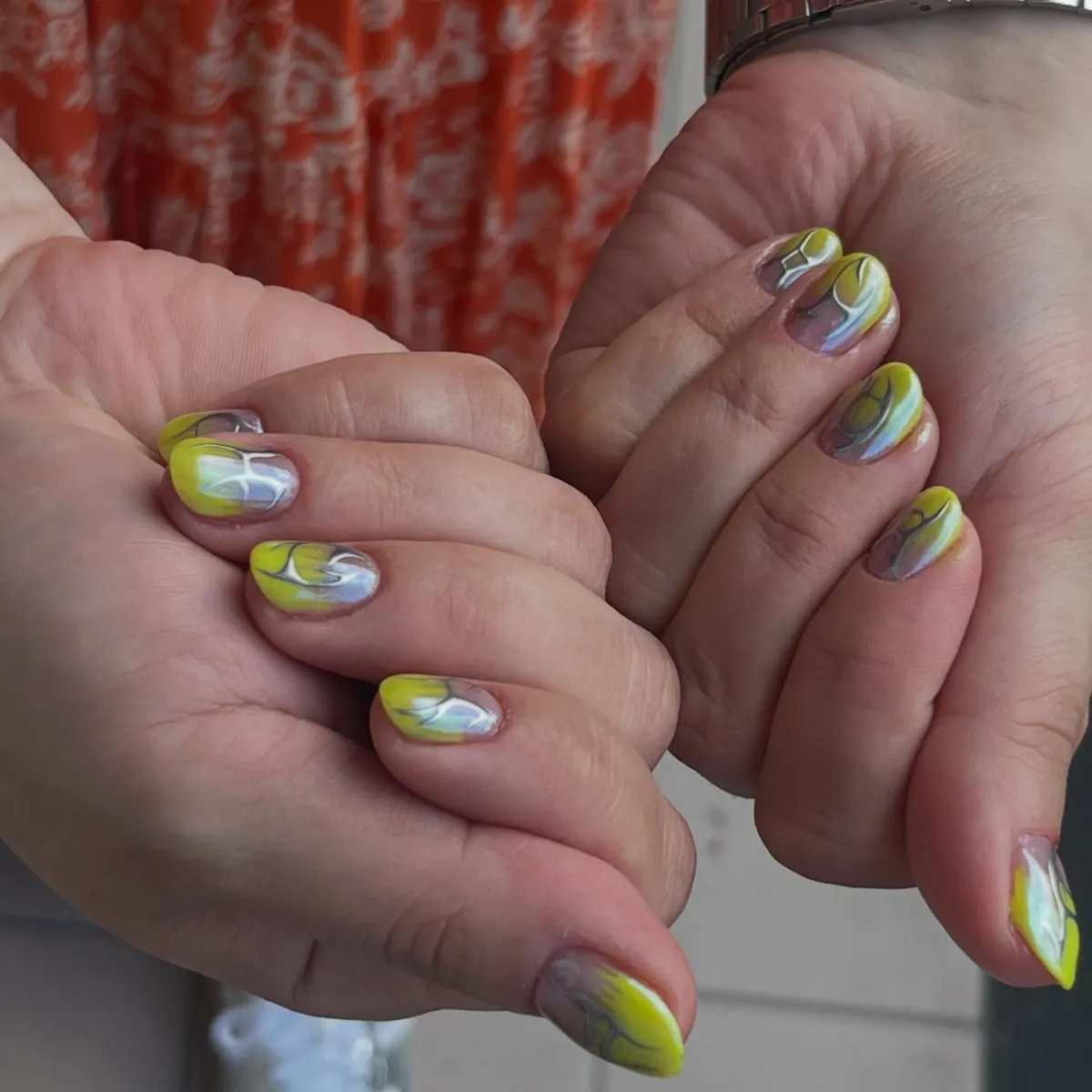 Short swirled yellow-green and cool-tone marbling