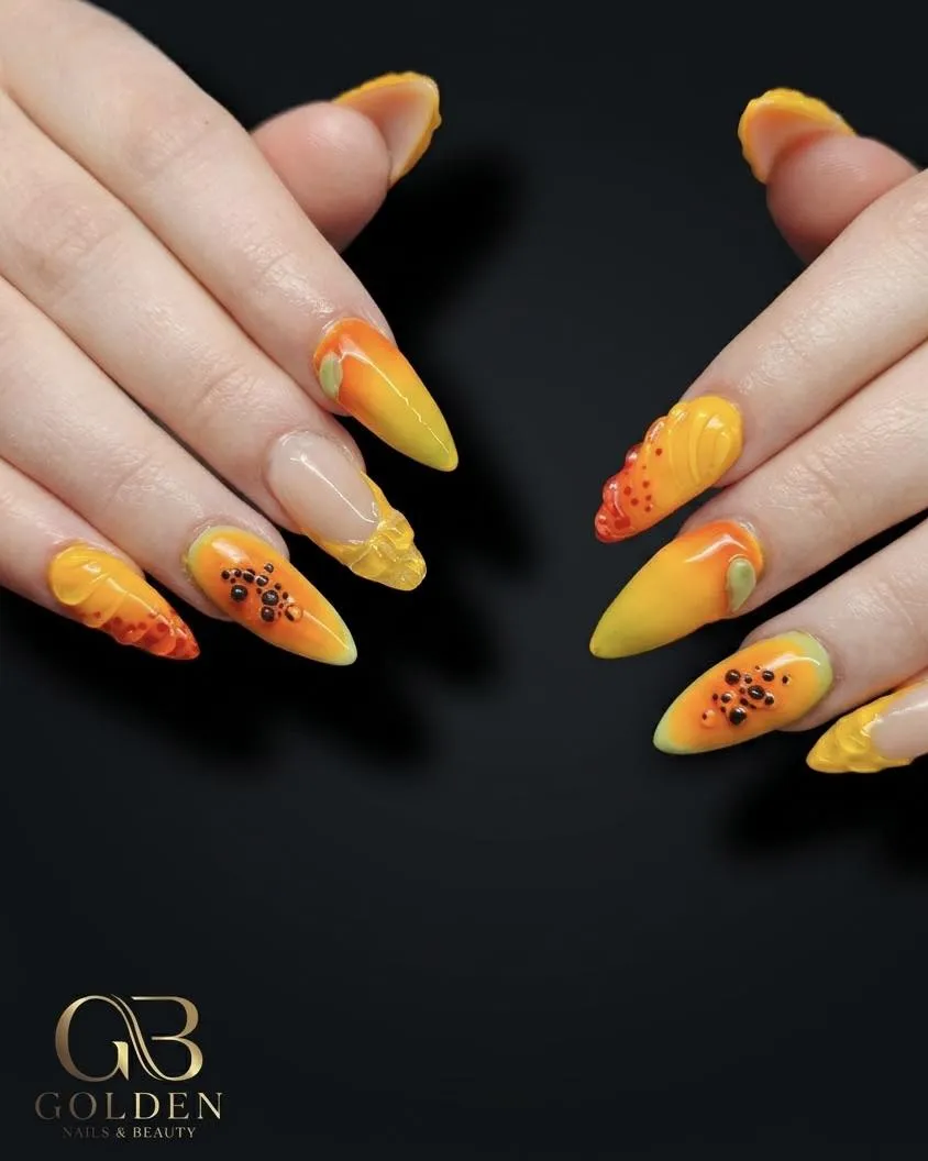 Yellow-orange gradient stilettos with raised 3D fruit-like details