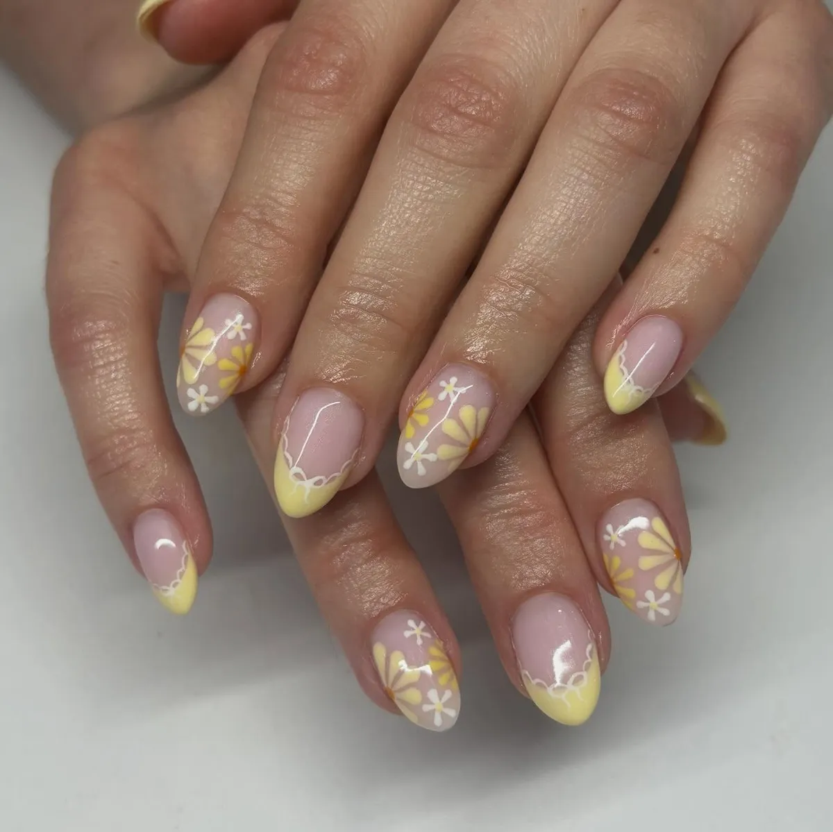 Scalloped Yellow French Tip with daisy-style florals