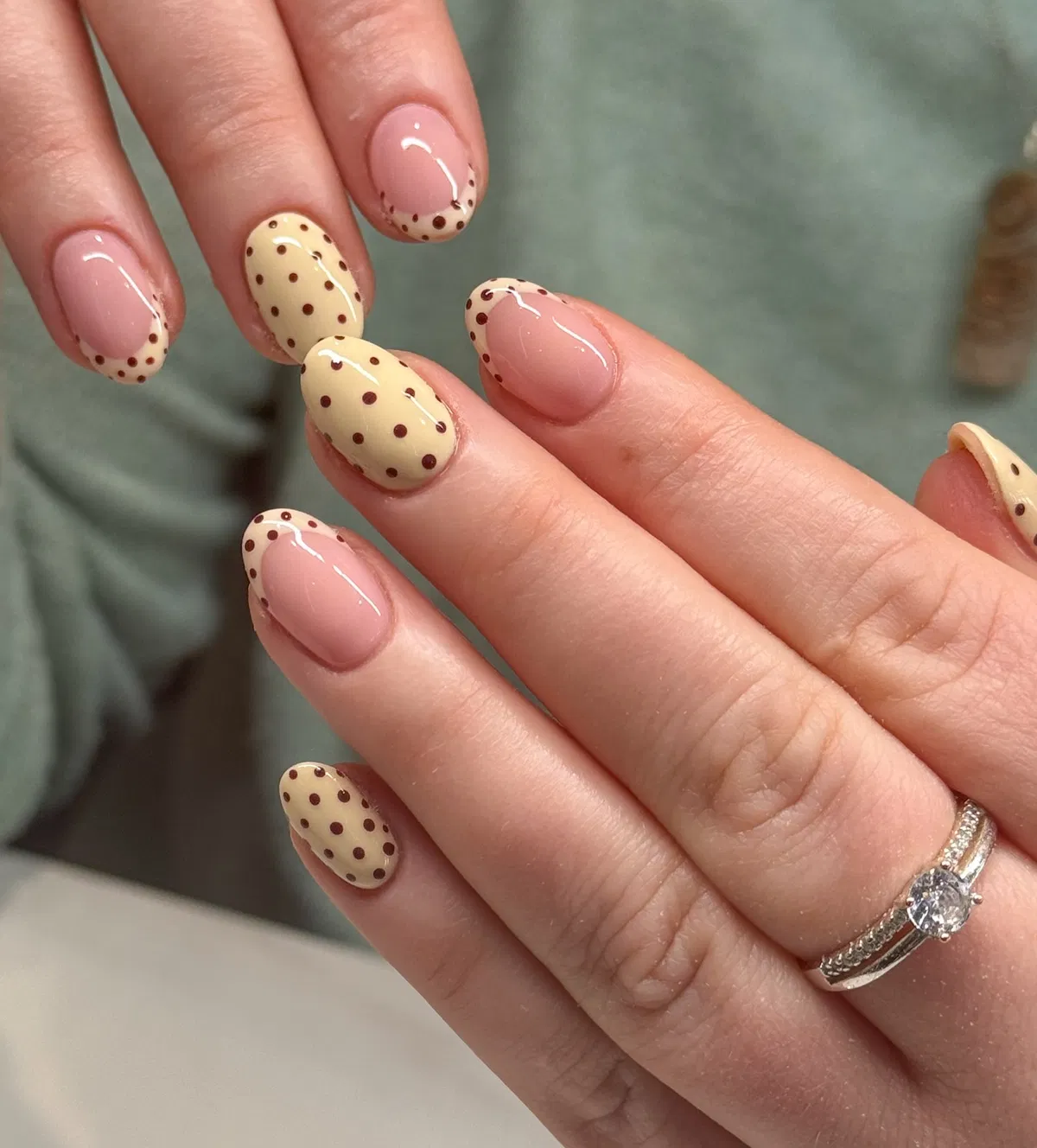 Pale yellow and brown polka-dot mix with dotted French tips