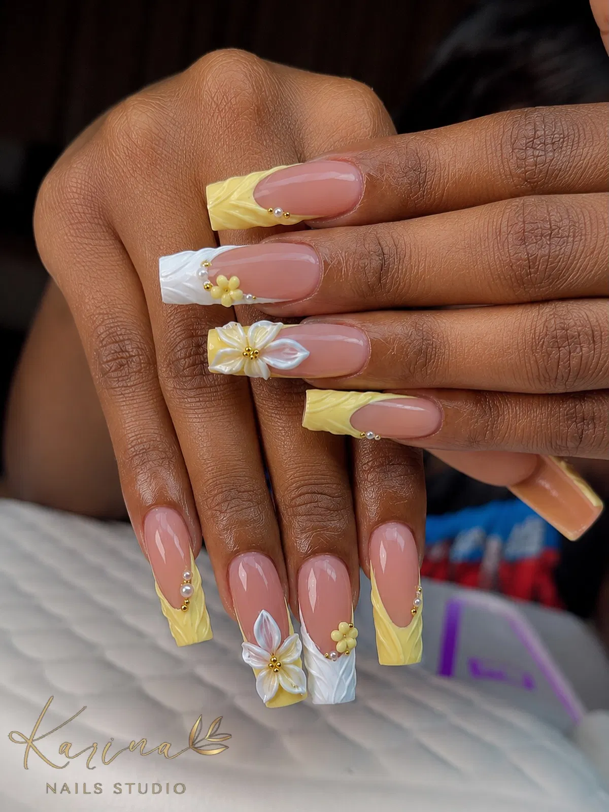 Nude Nails with Pale Yellow/White Tips and Raised Floral Accents
