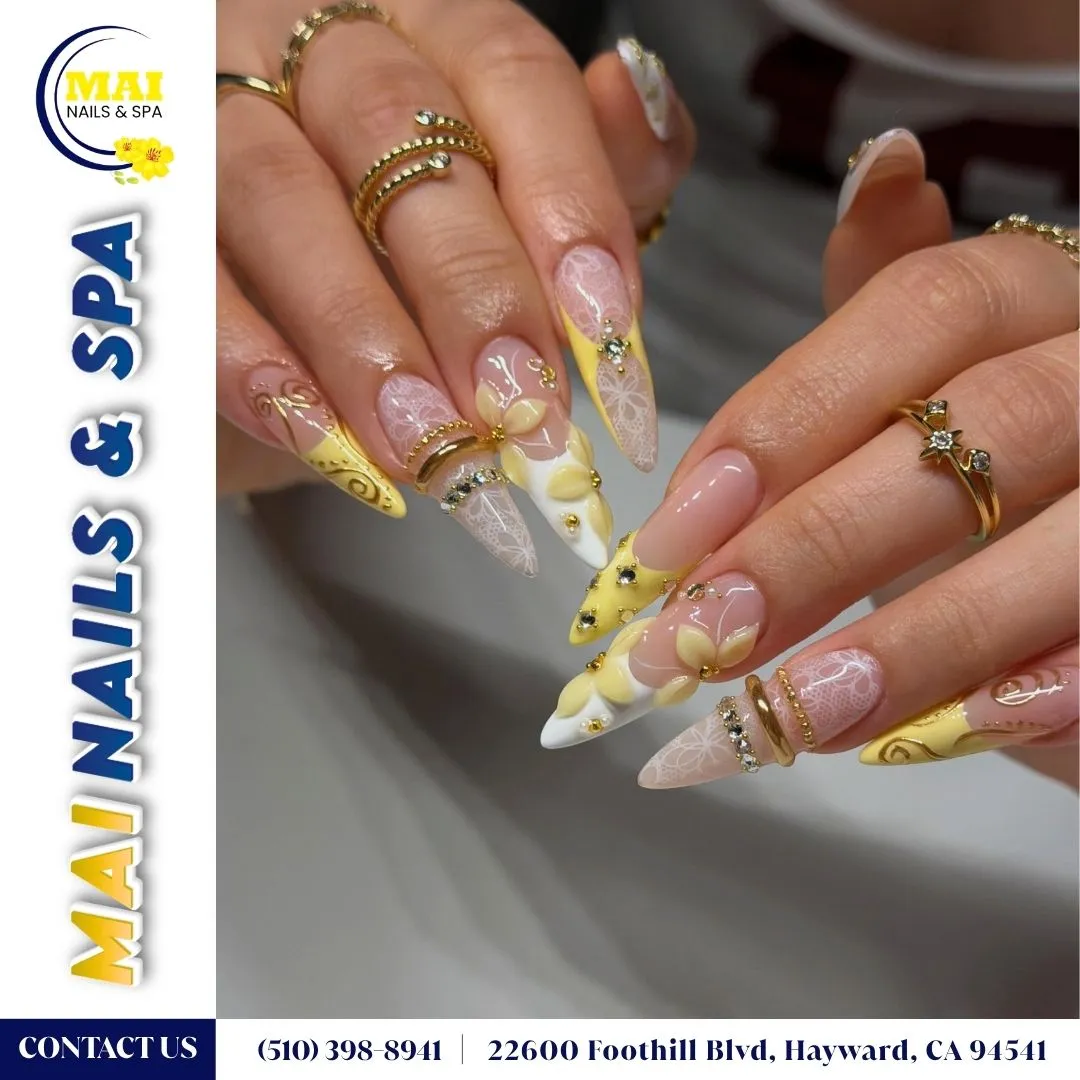 Ornate Yellow-and-White Floral Nails with Lace Patterns
