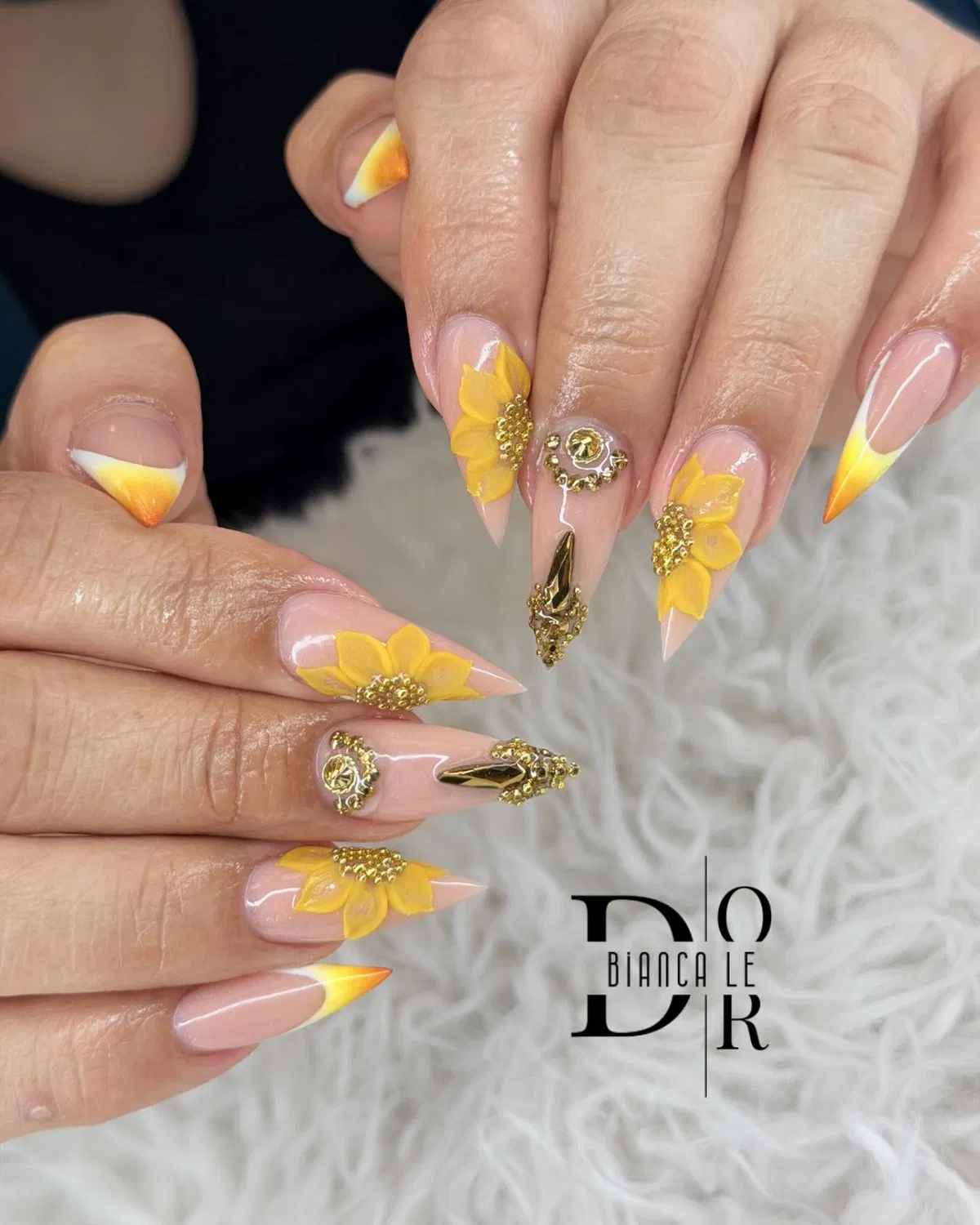 Pointed V-tip yellow/orange ombre with raised flowers and gold charms