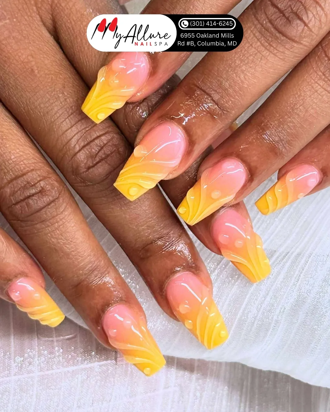 Pink-to-yellow ombre square nails with raised swirl lines