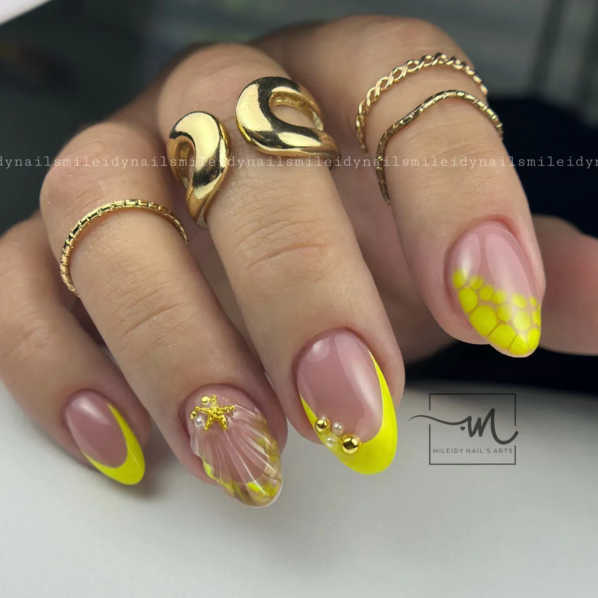 Neon yellow French tips with honeycomb and shell texture