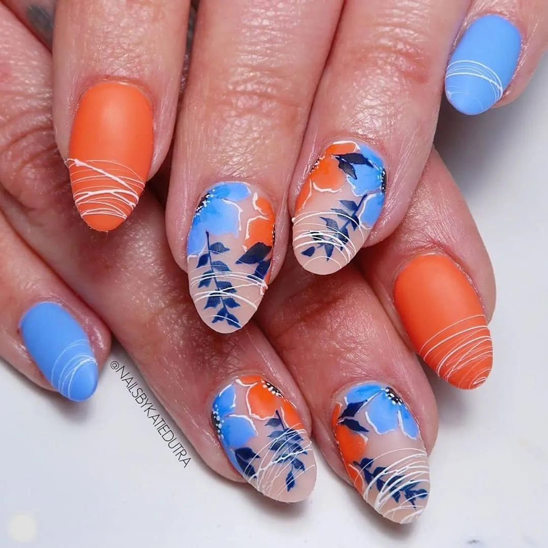 Matte orange and blue with floral-and-leaf accent art and fine white linework
