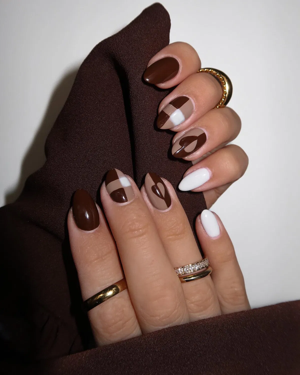 Geometric brown color-blocking with crisp white accents
