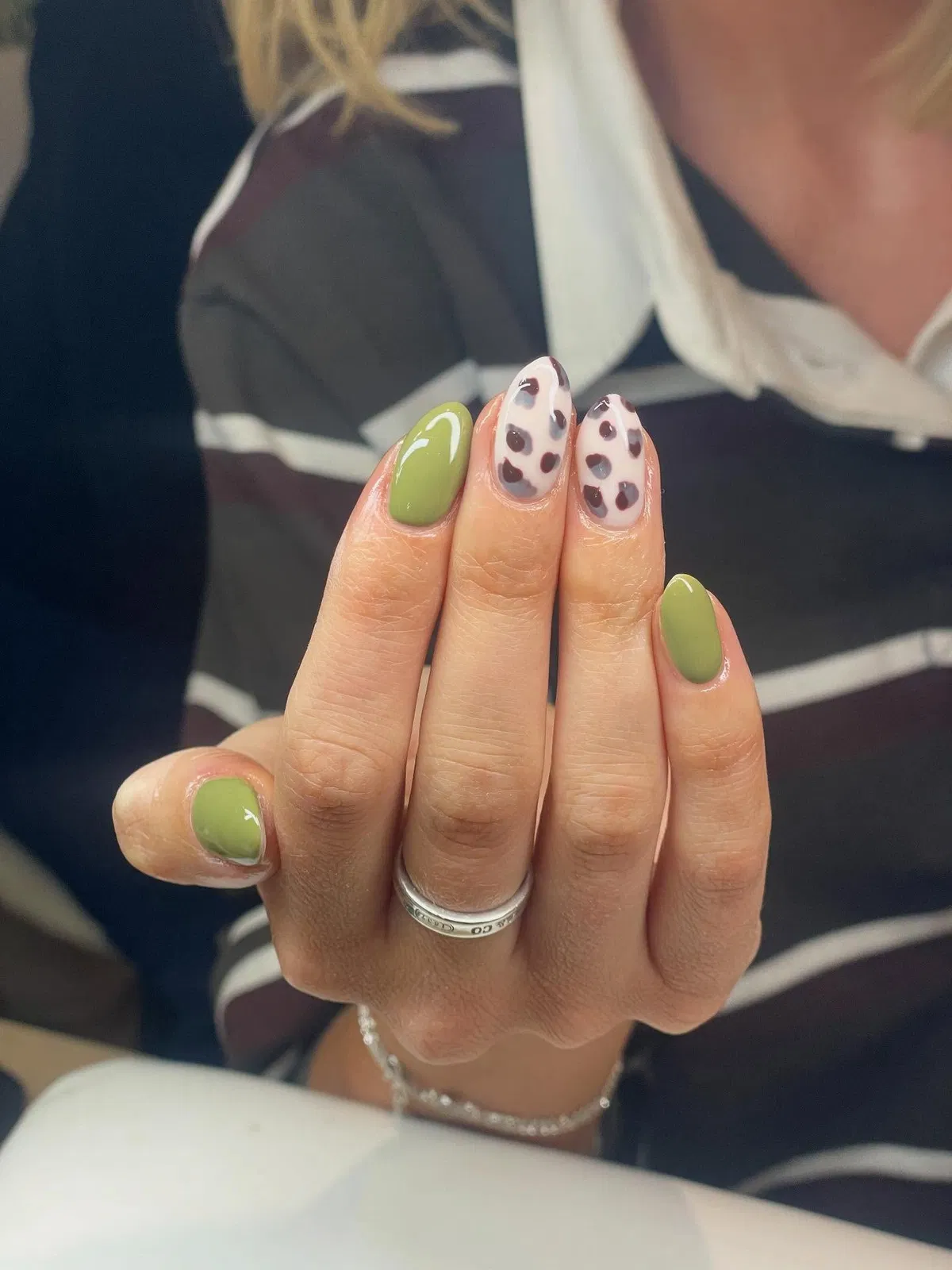 Olive green with spotted accent nails