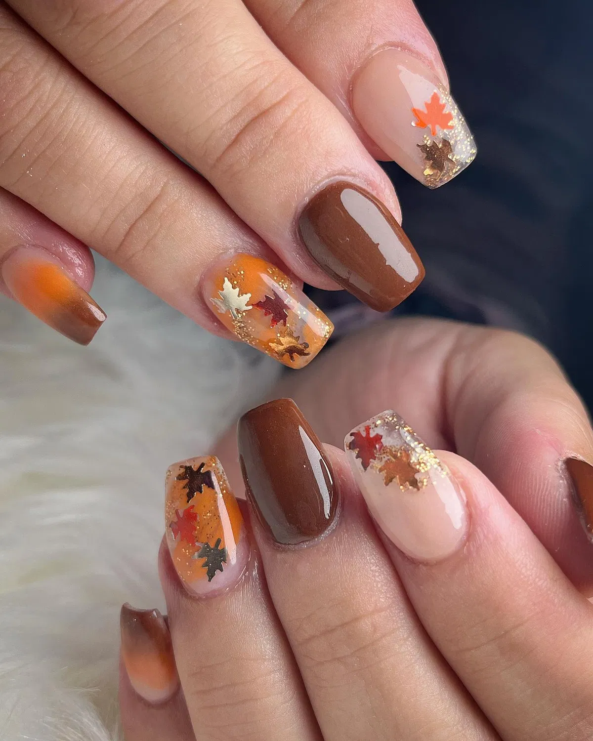 Brown solids with orange gradient and leaf confetti accents