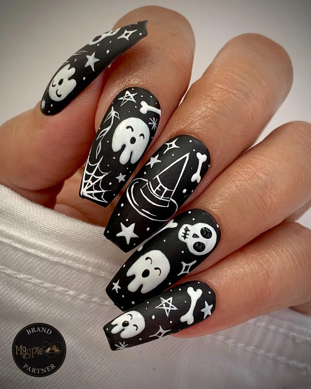 Matte Black Coffin Nails with White Halloween Icons