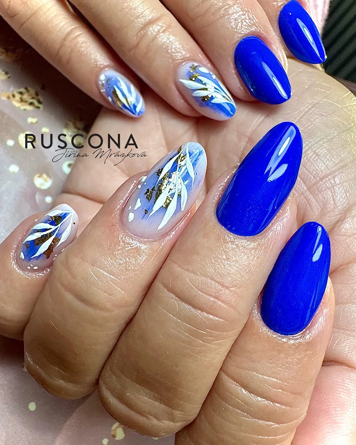 Royal blue solids with pale-base brushstroke accents and gold foil-like flecks