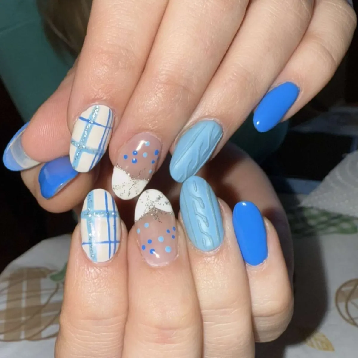 Mixed blue set with grid lines, raised waves, and dotted nude accents