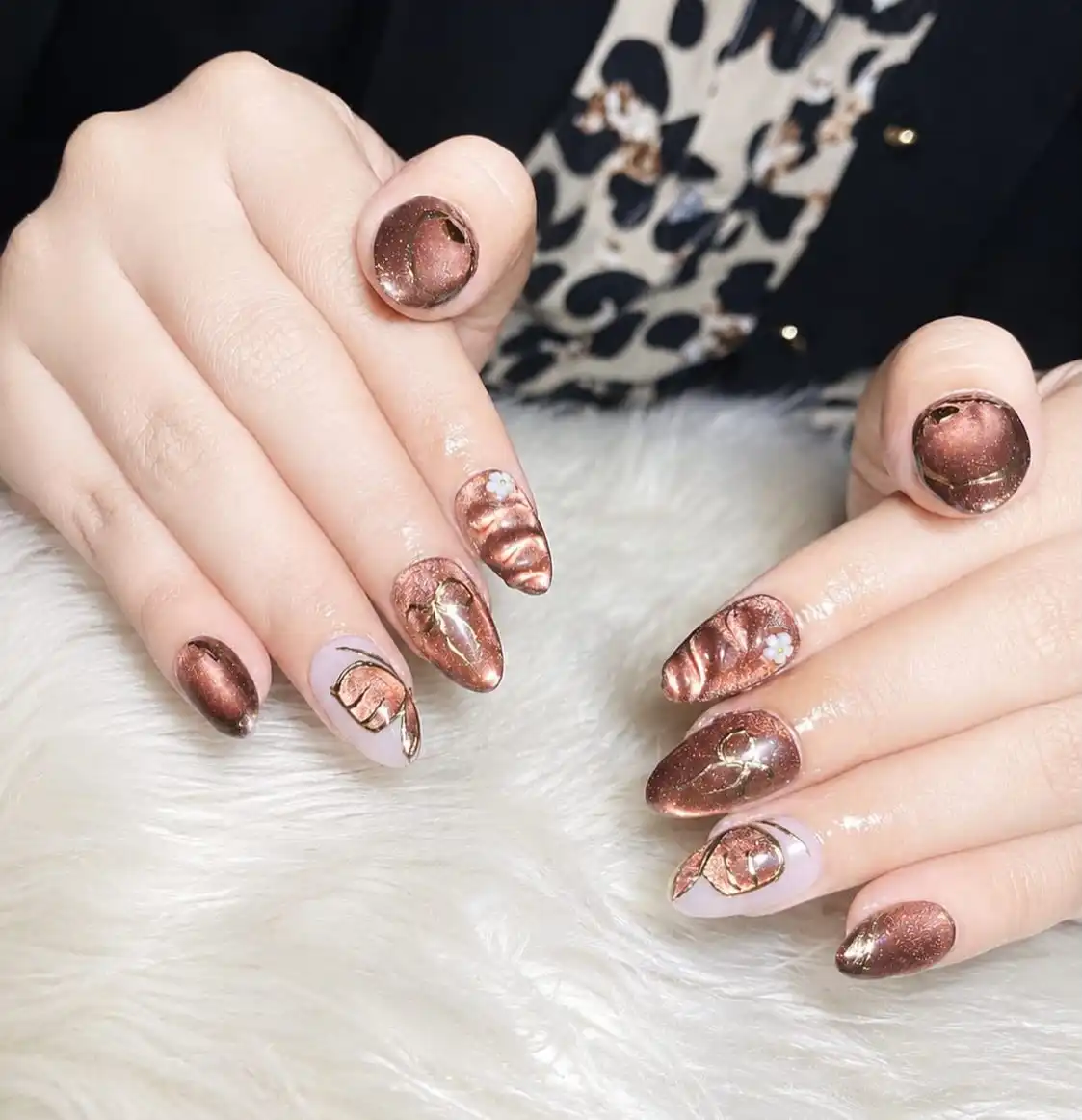 Copper-brown metallic with raised waves and lavender-gold accents
