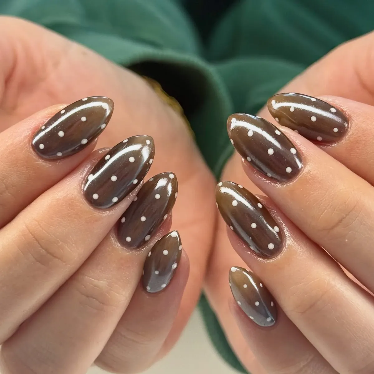 Glossy brown with white polka dots