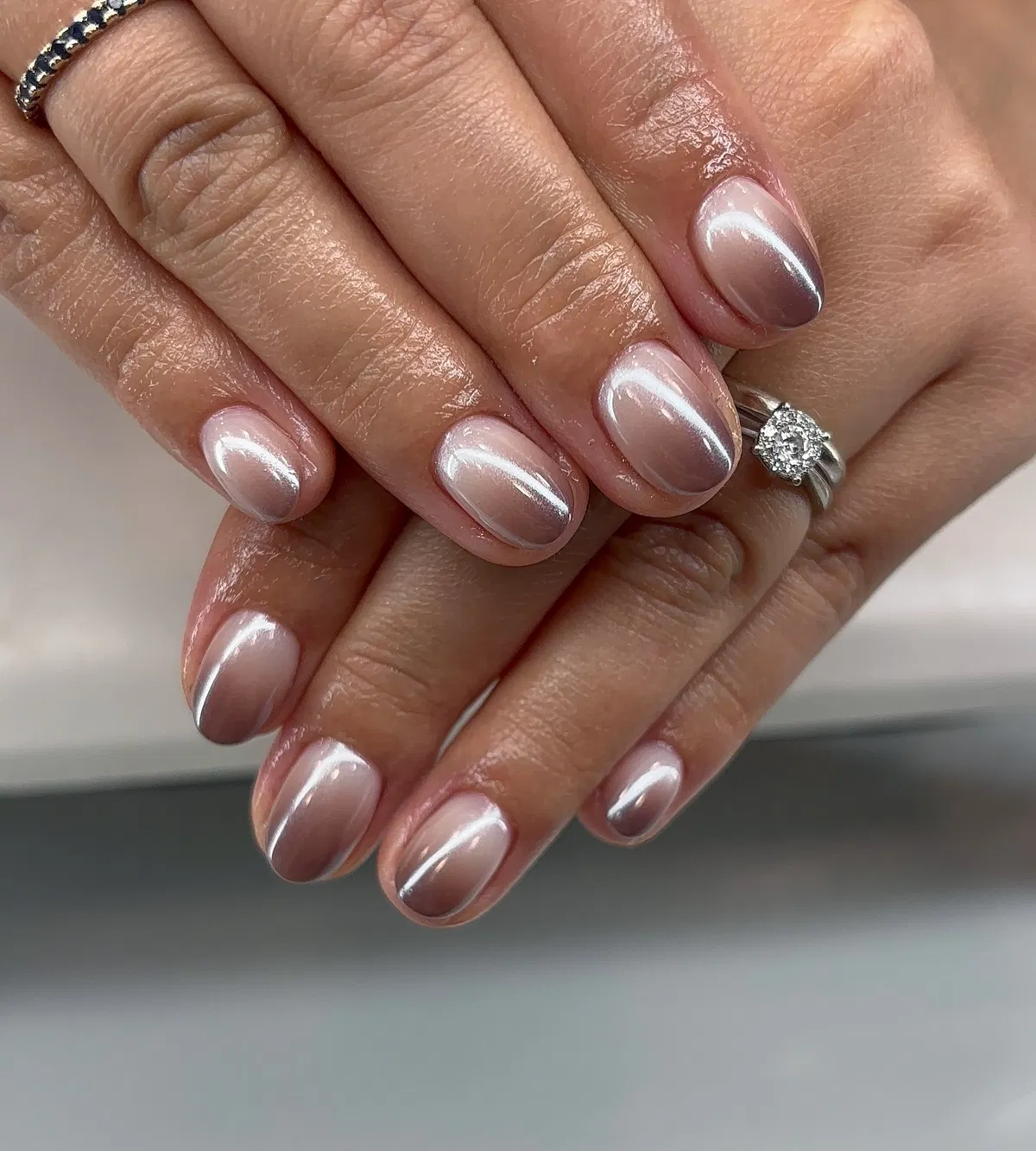 Pale pink pearly shine (subtle metallic reflection)