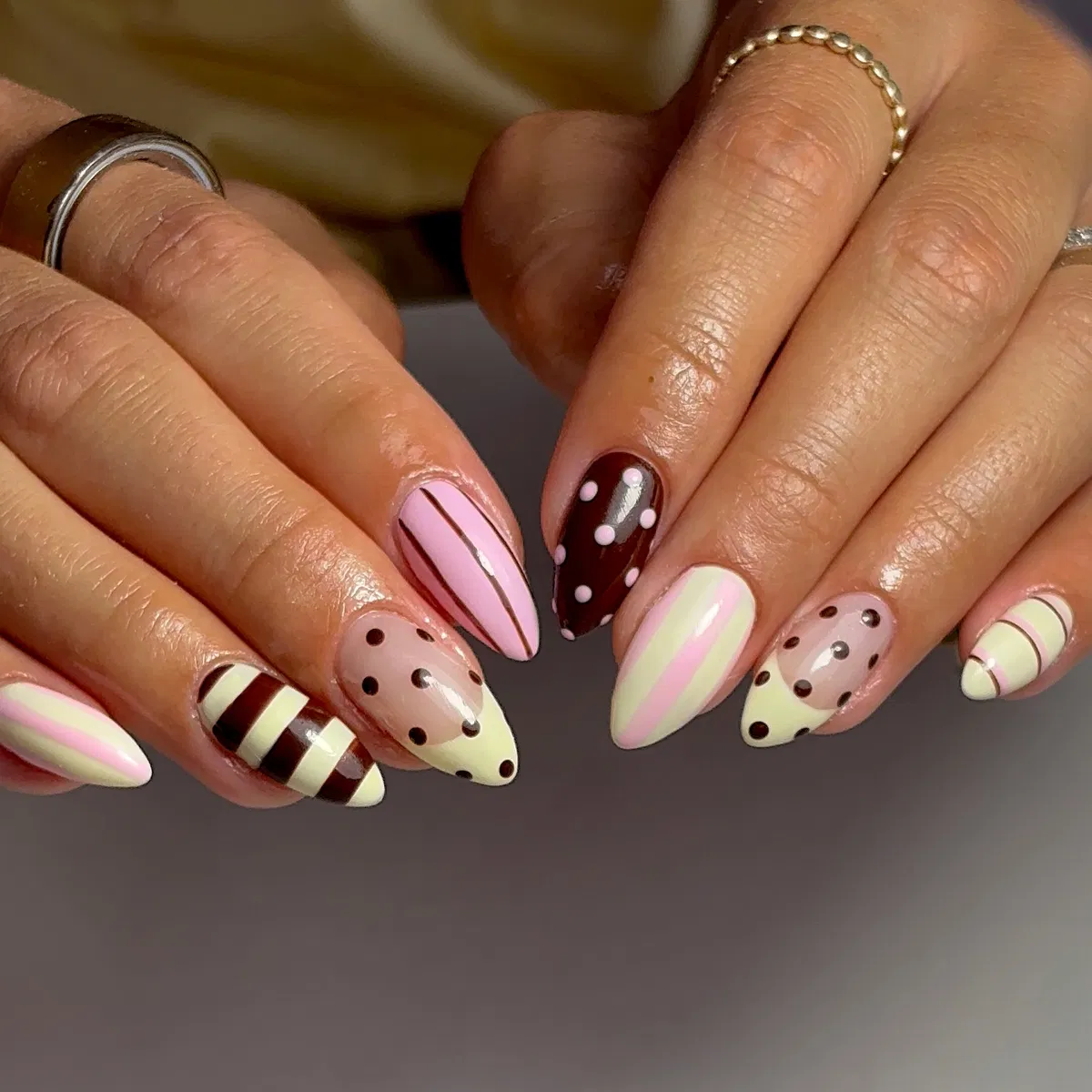 Brown, pink, and cream mix with stripes and polka dots