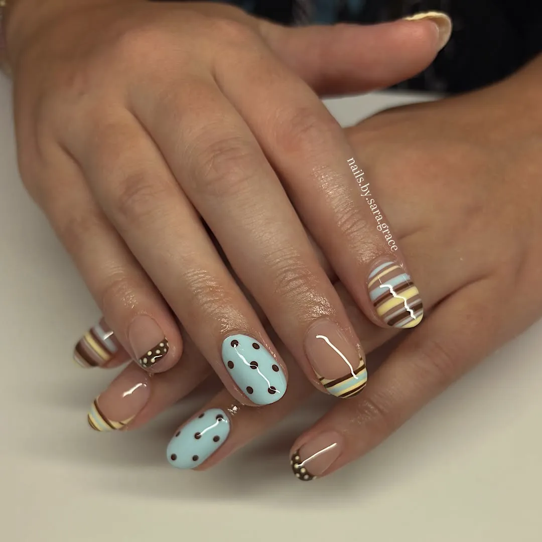 Nude and pale blue mix with brown dots and striped accents