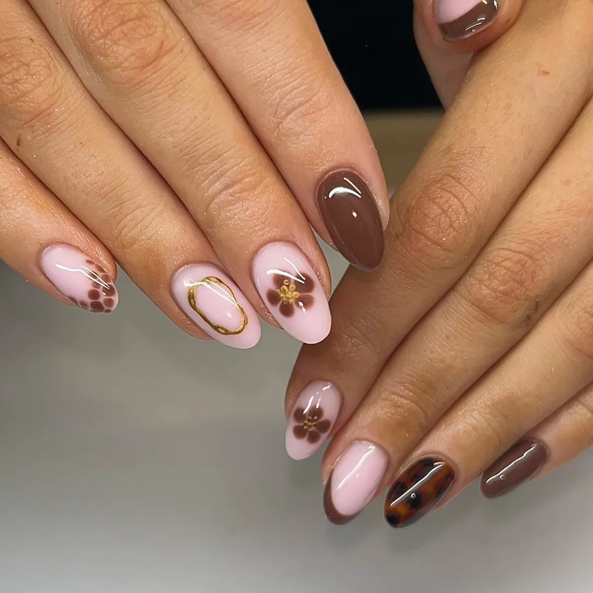 Pink and brown florals with a glossy graphic accent