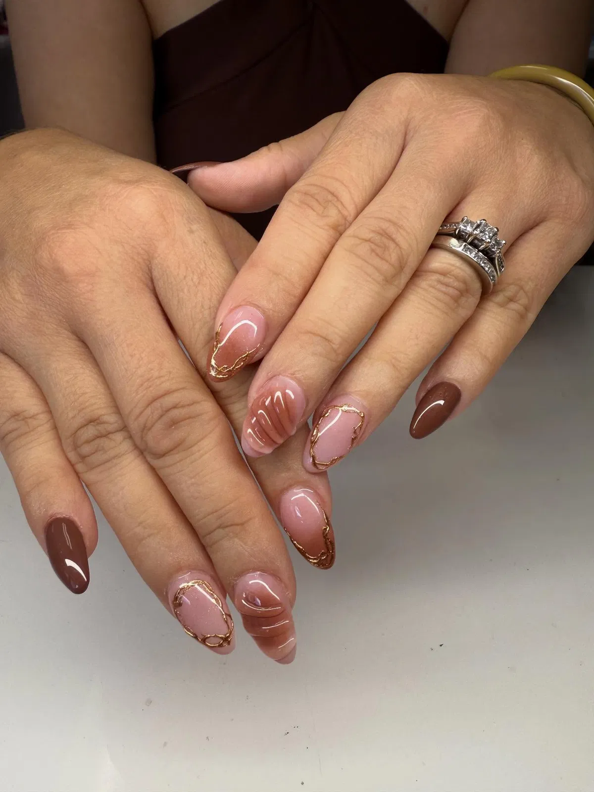 Brown and pink mix with irregular gold outlines