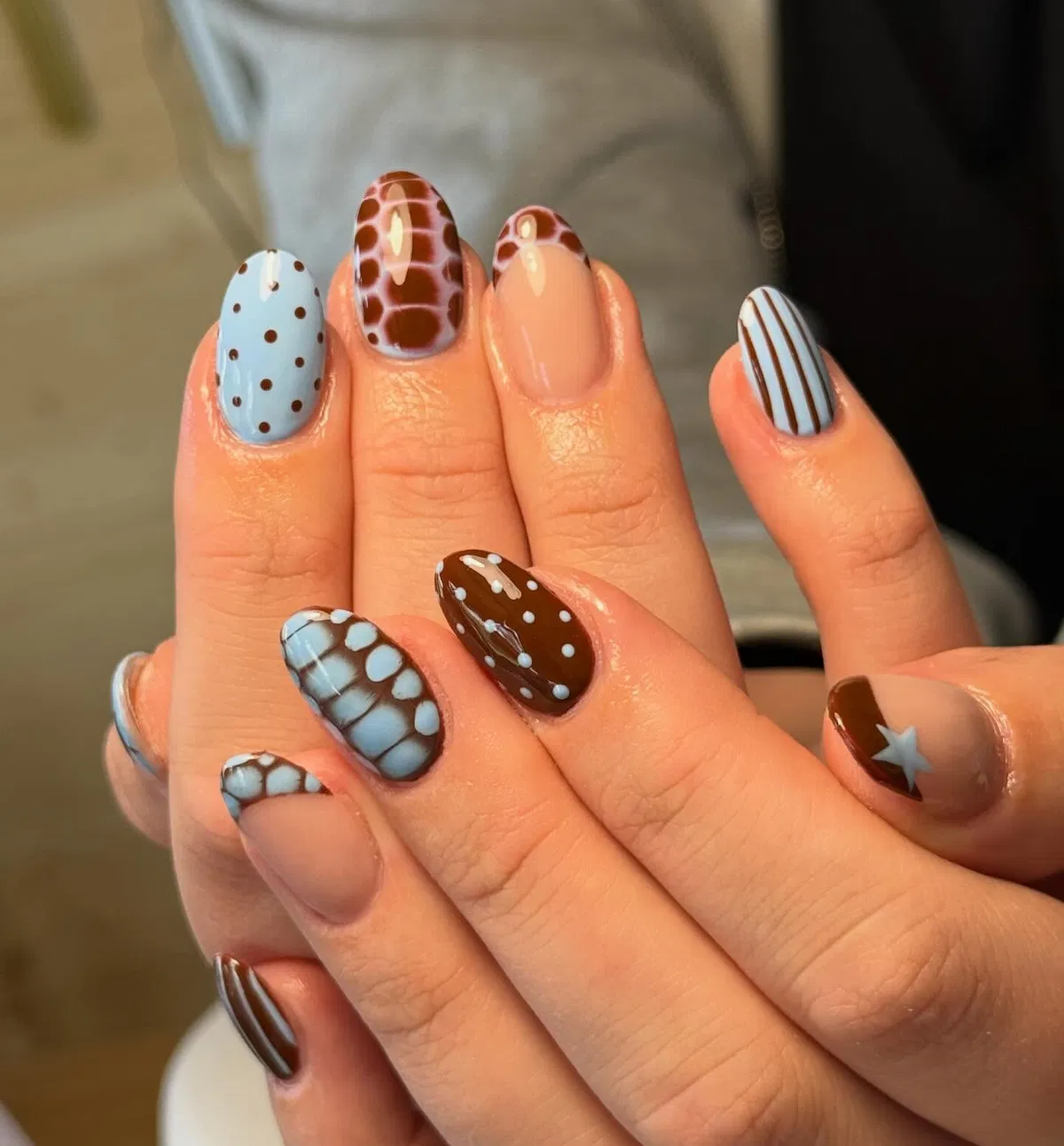 Brown and light blue mix with dots, stripes, and star