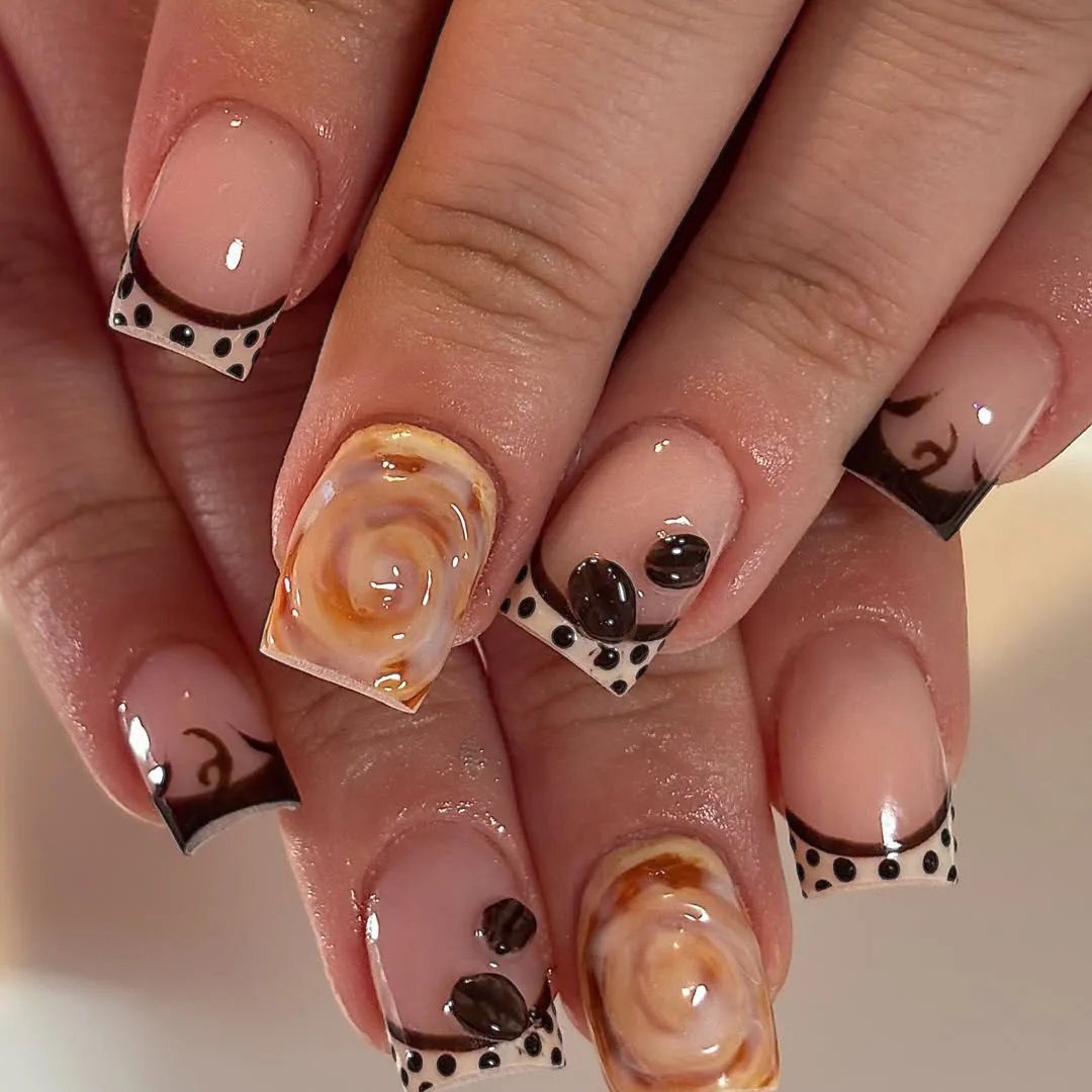 Square nude French tips with dotted bands and swirl accents