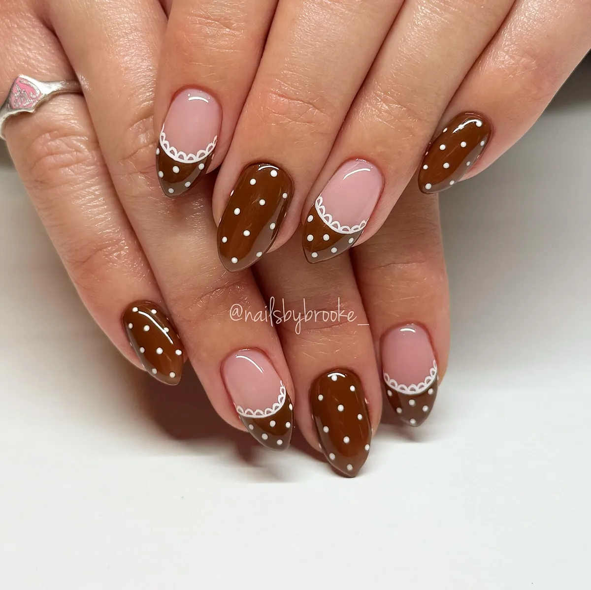 Brown polka dots with scalloped French-style tips