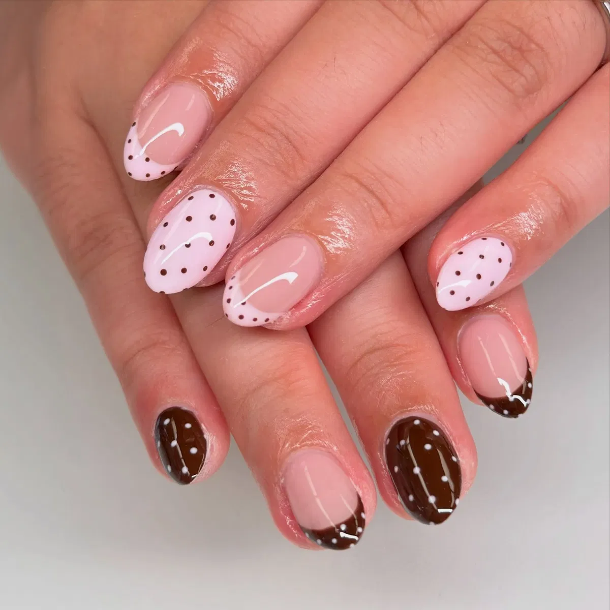 Pale pink dots with dark brown French tips