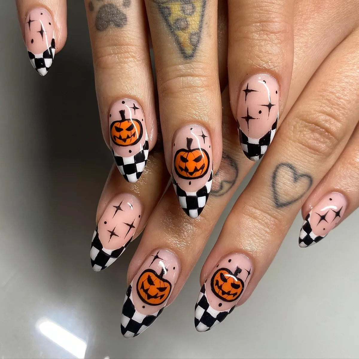 Checkerboard Tips with Orange Pumpkin Faces