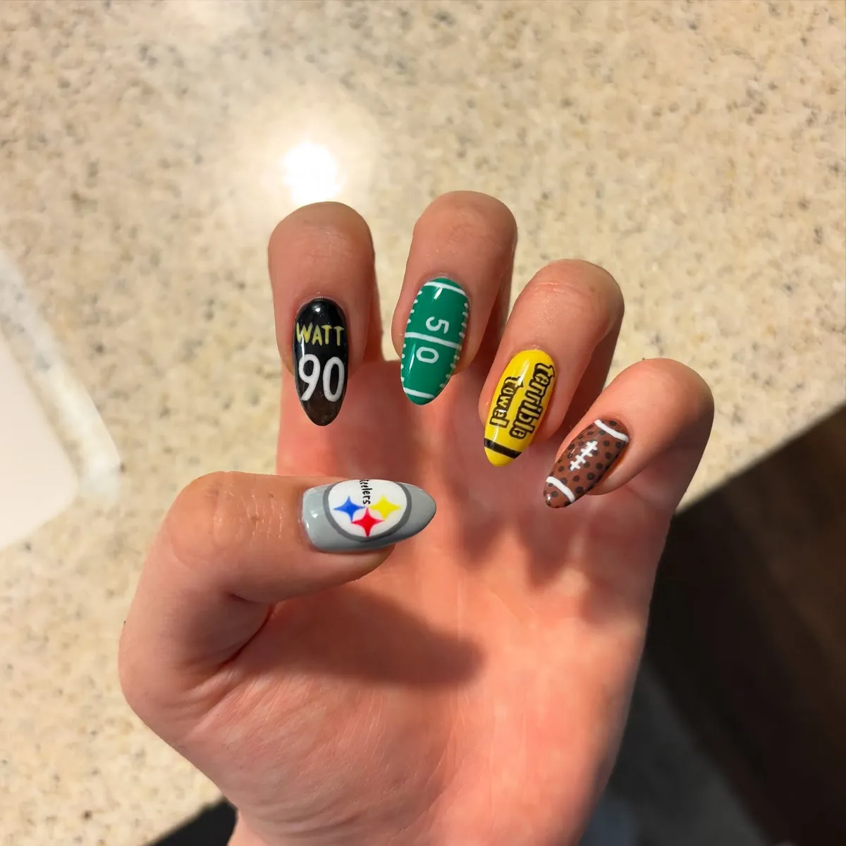 Text nails with field markings and football motif