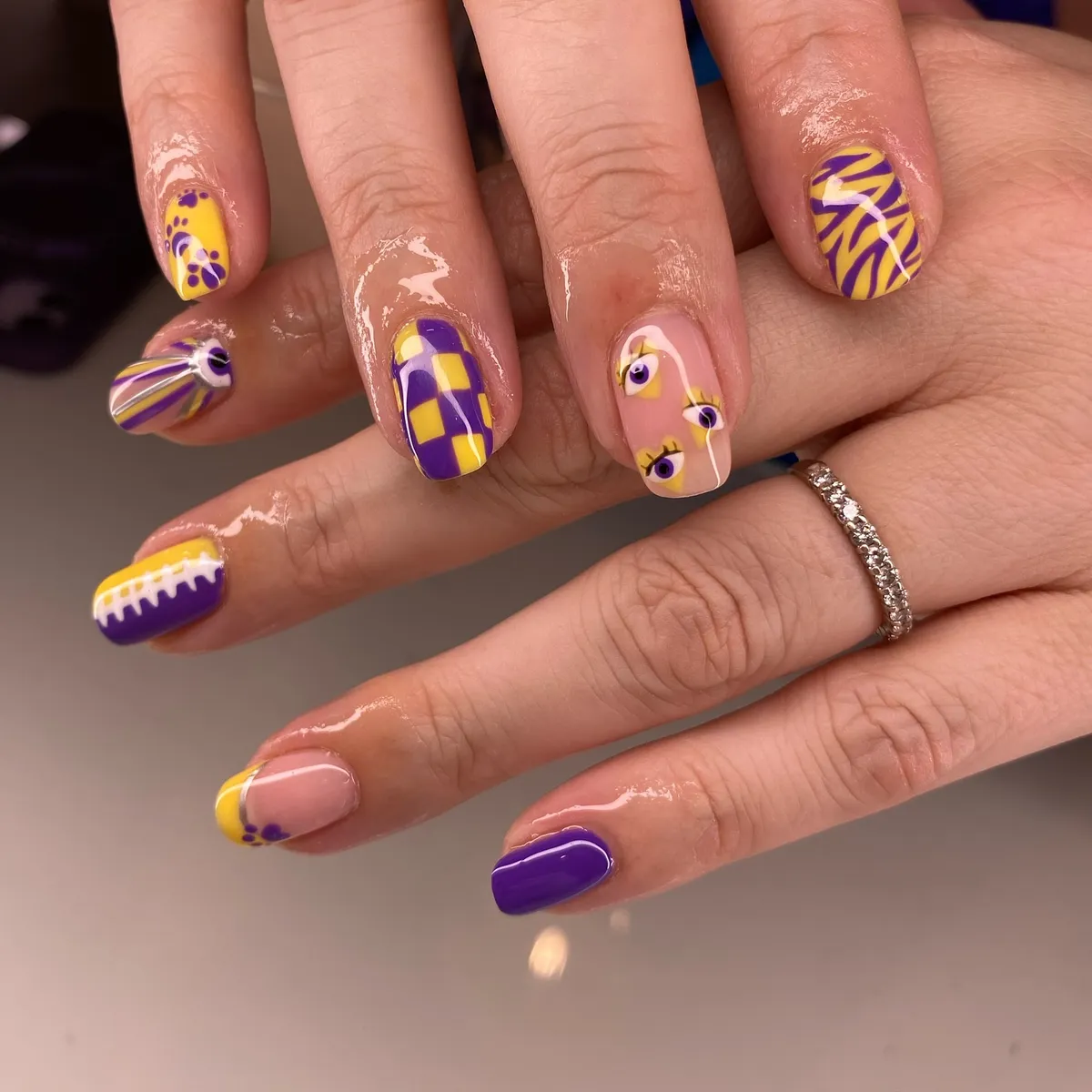 Purple and yellow mixed patterns with eye art