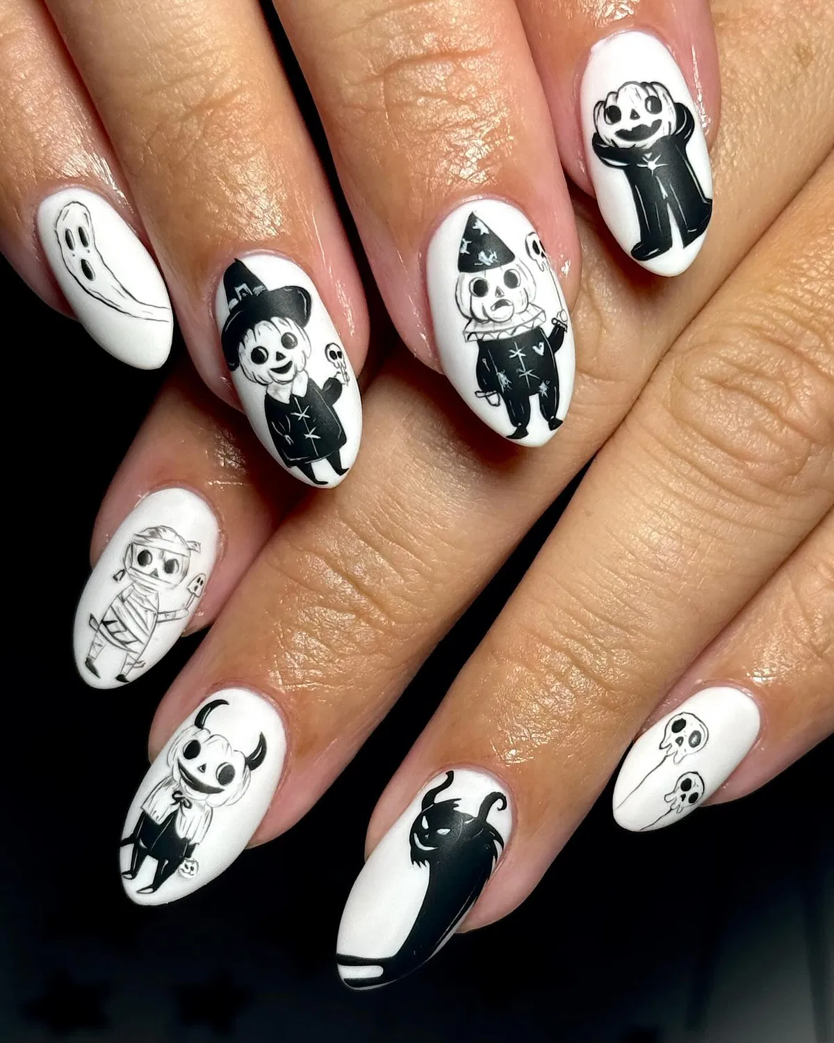 Black illustration Halloween characters on a white base