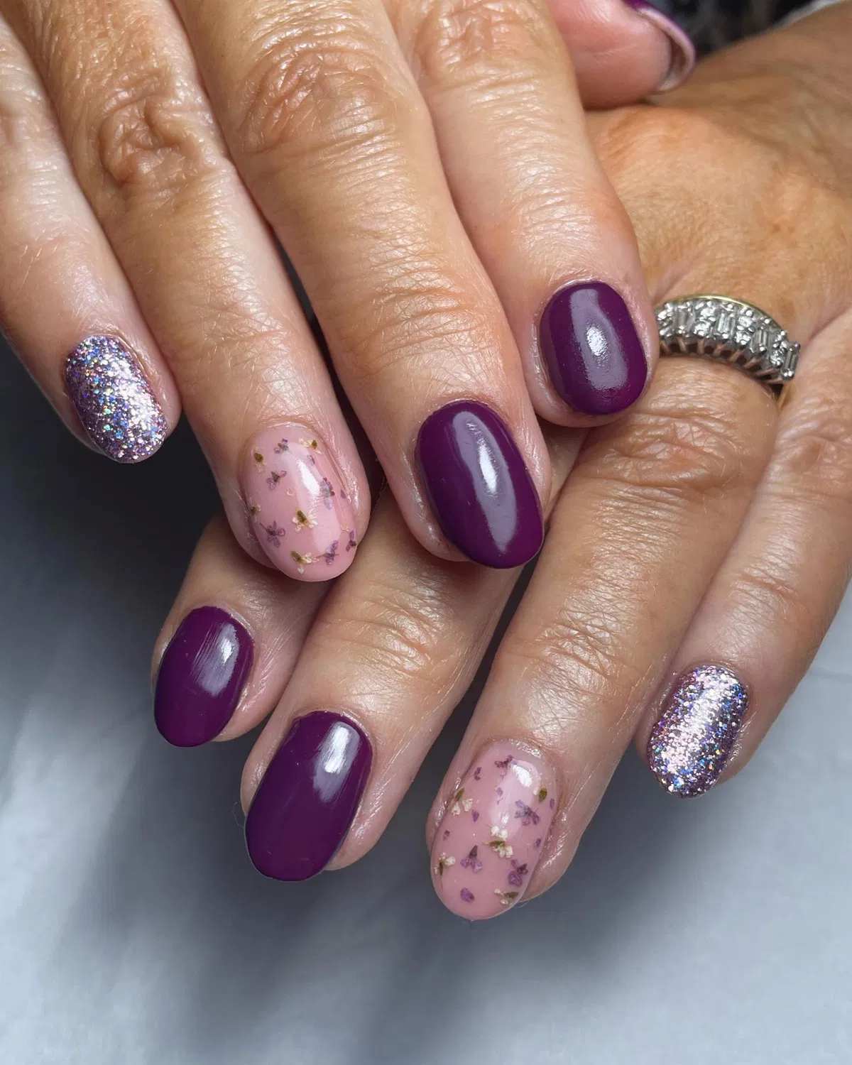 Deep plum with glitter and flecked nude accents