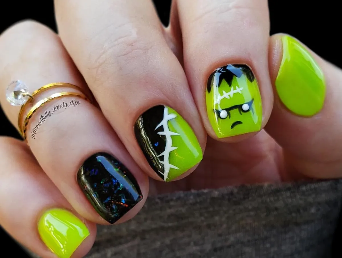 Neon green and black character nails