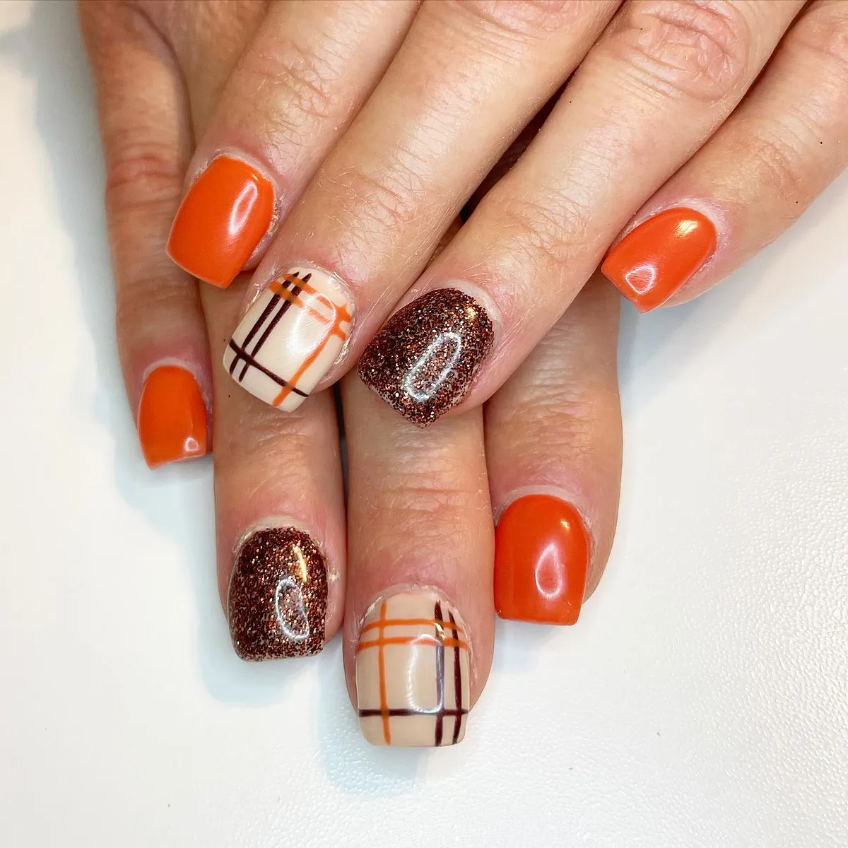 Orange solids with plaid and glitter accents