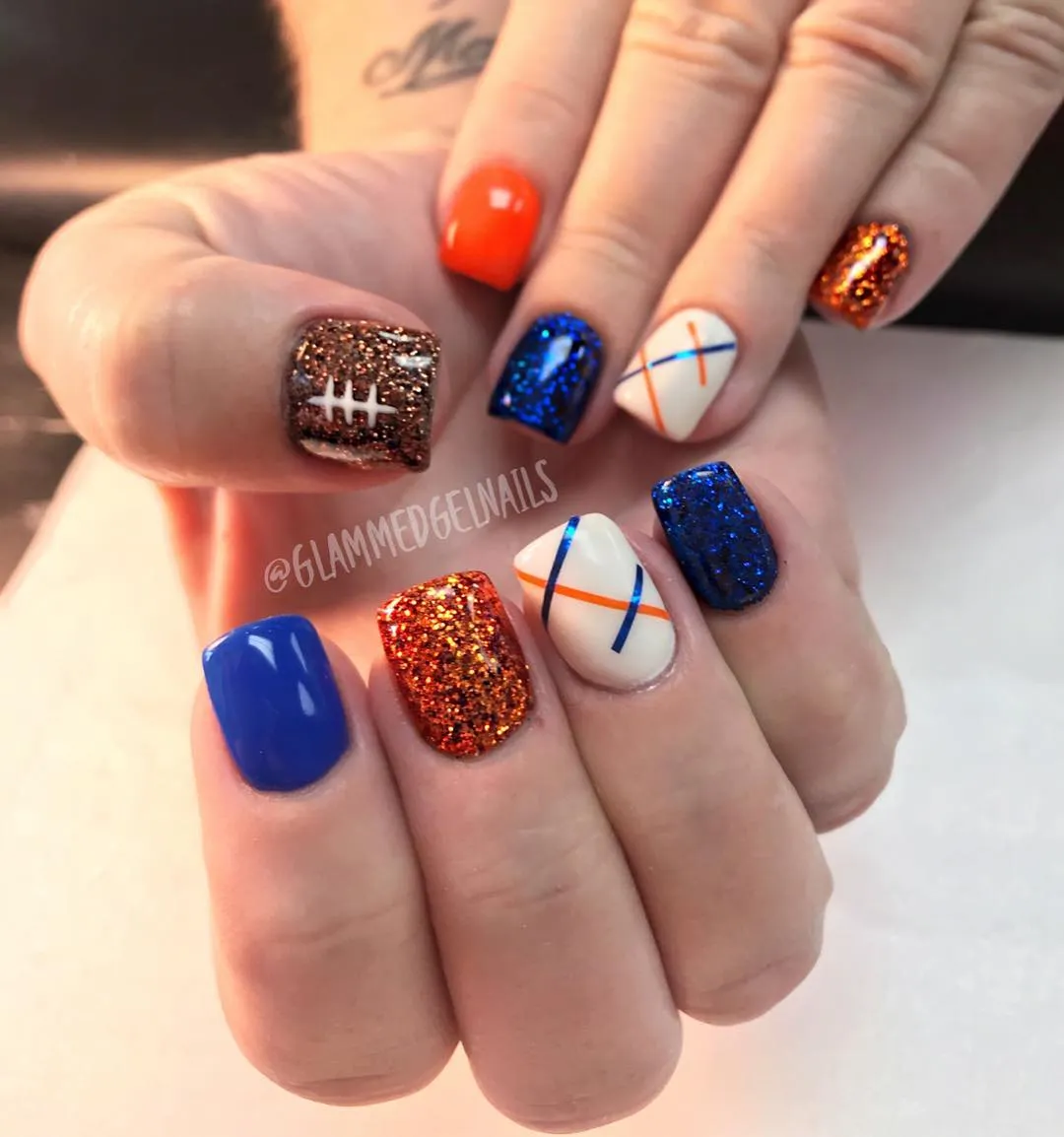 Orange and blue glitter mix with football-lace accent
