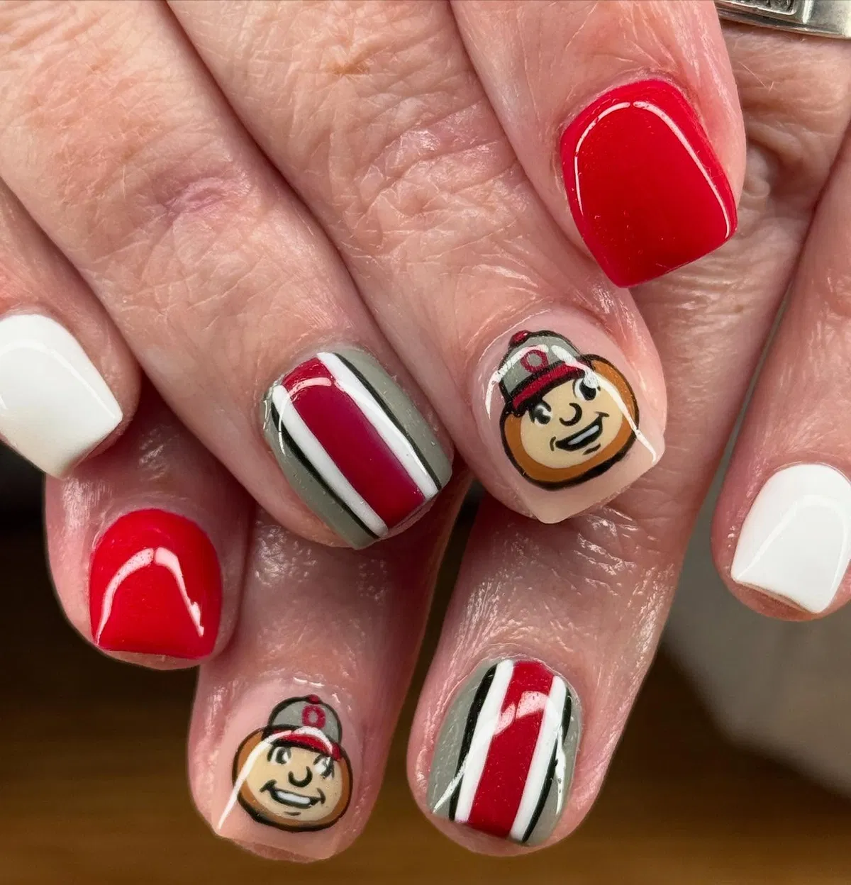 Red/white stripes with cartoon-face accents