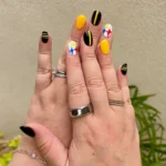 🏆 18 Football Inspired Nails That Score Big on Cute and Creative Team Spirit Fashion image by @nouvellenailsllc