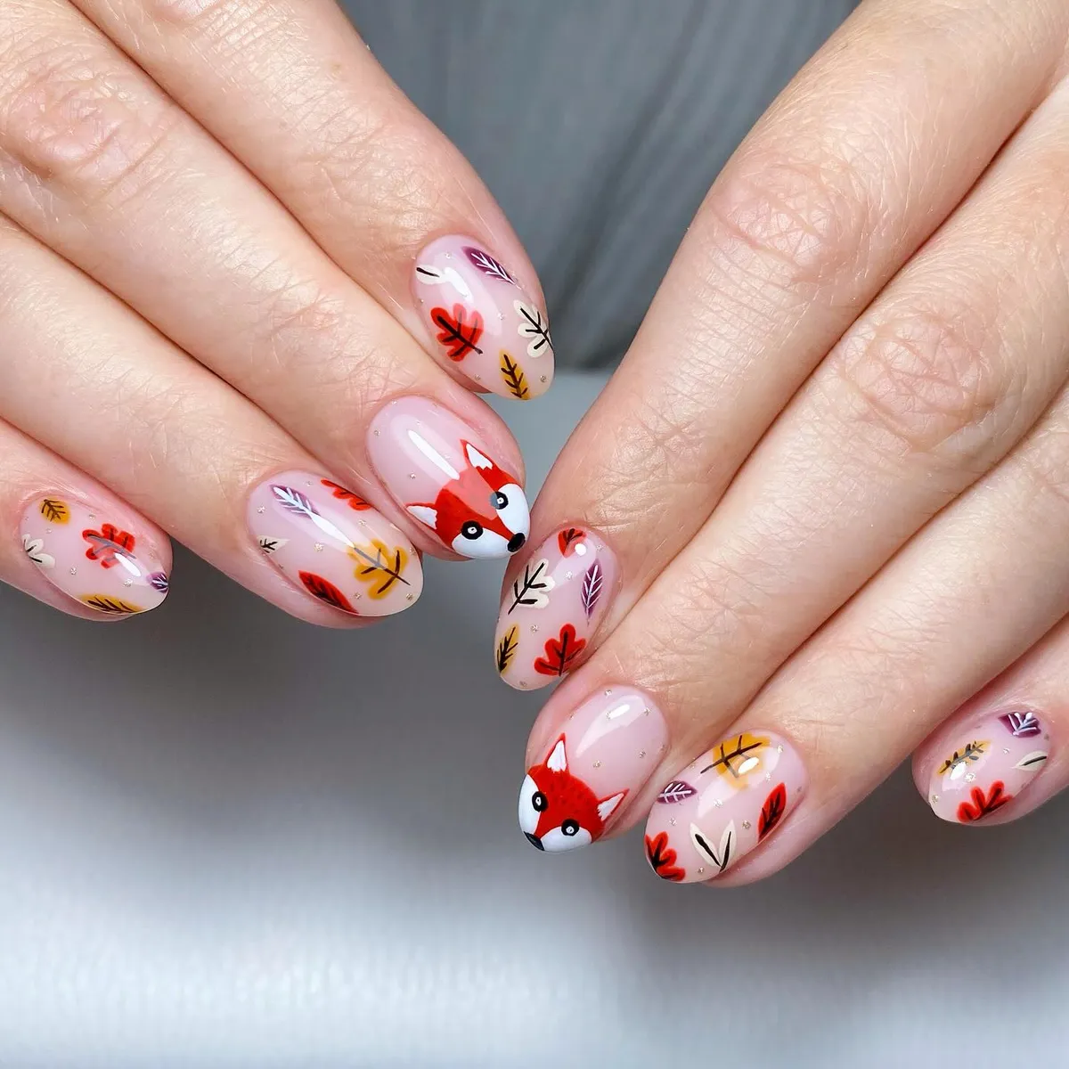 Sheer pink leaf scatter with fox faces