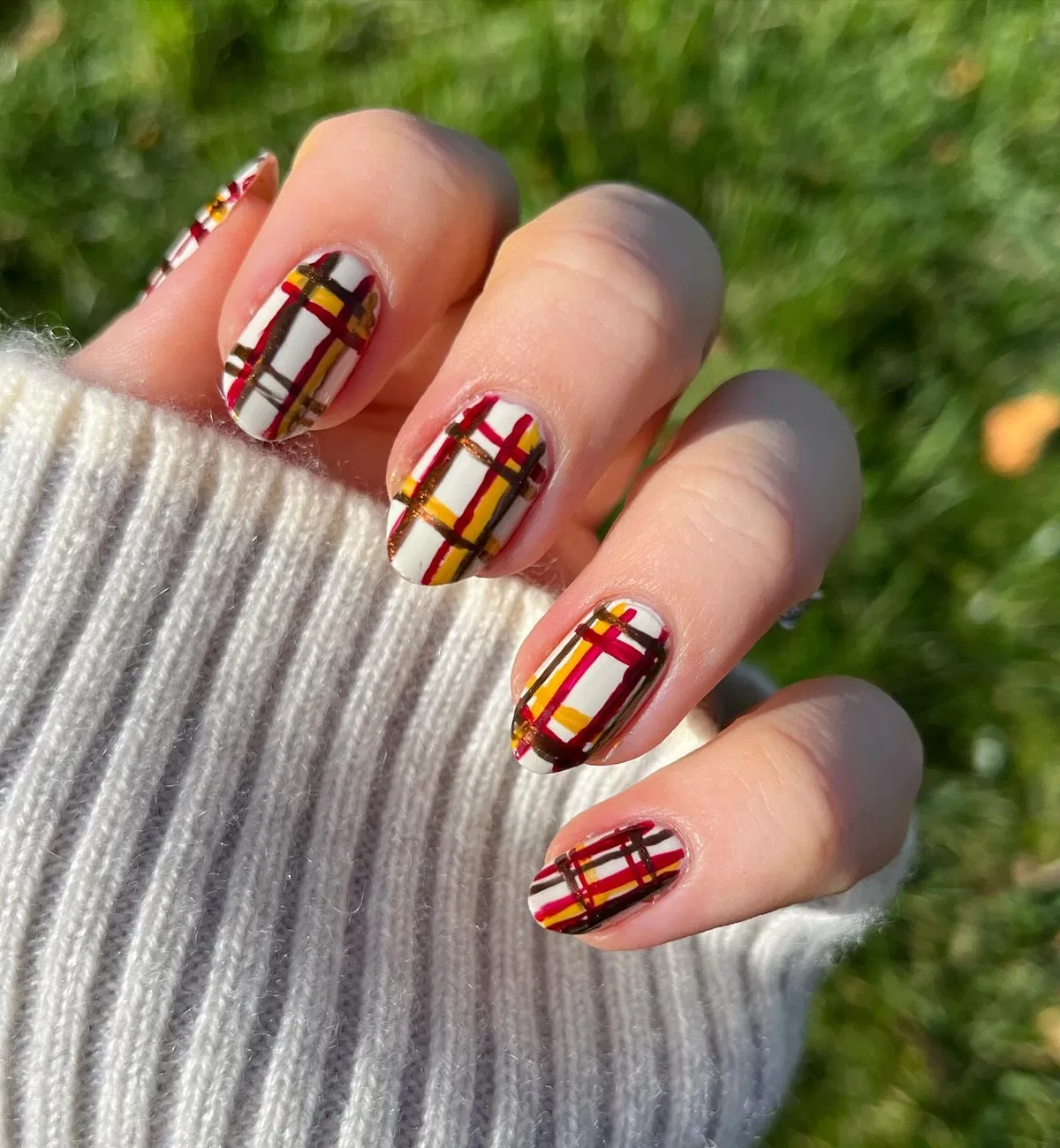 Cream plaid with red, yellow, and dark lines