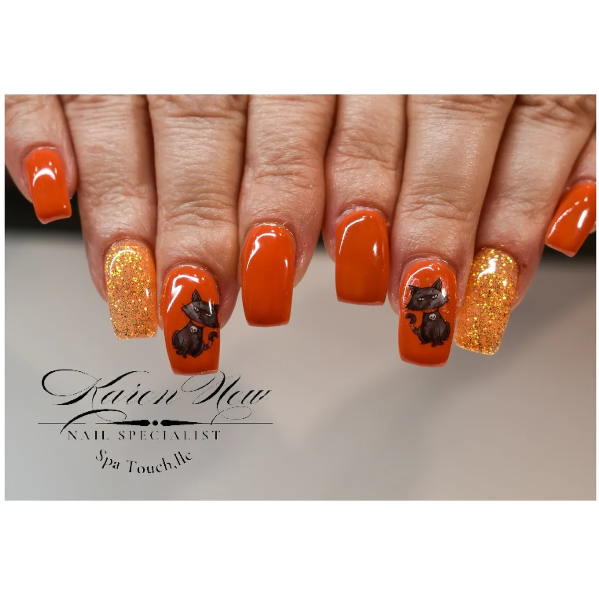 Bright orange with gold glitter and black cat art