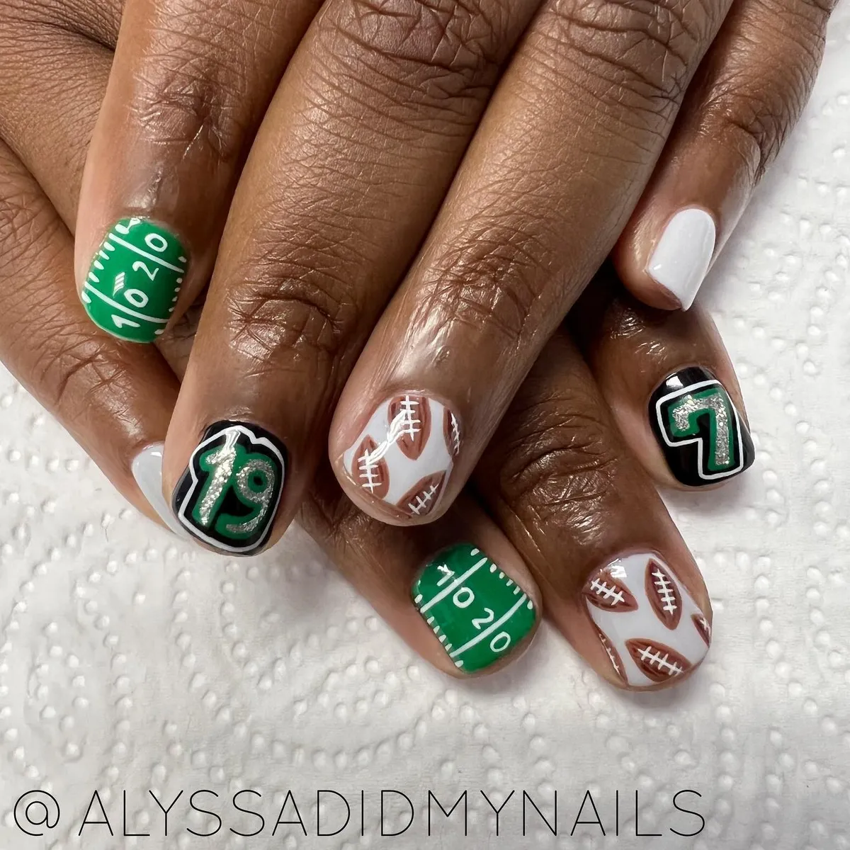 Green yardlines + football pattern + bold number nails