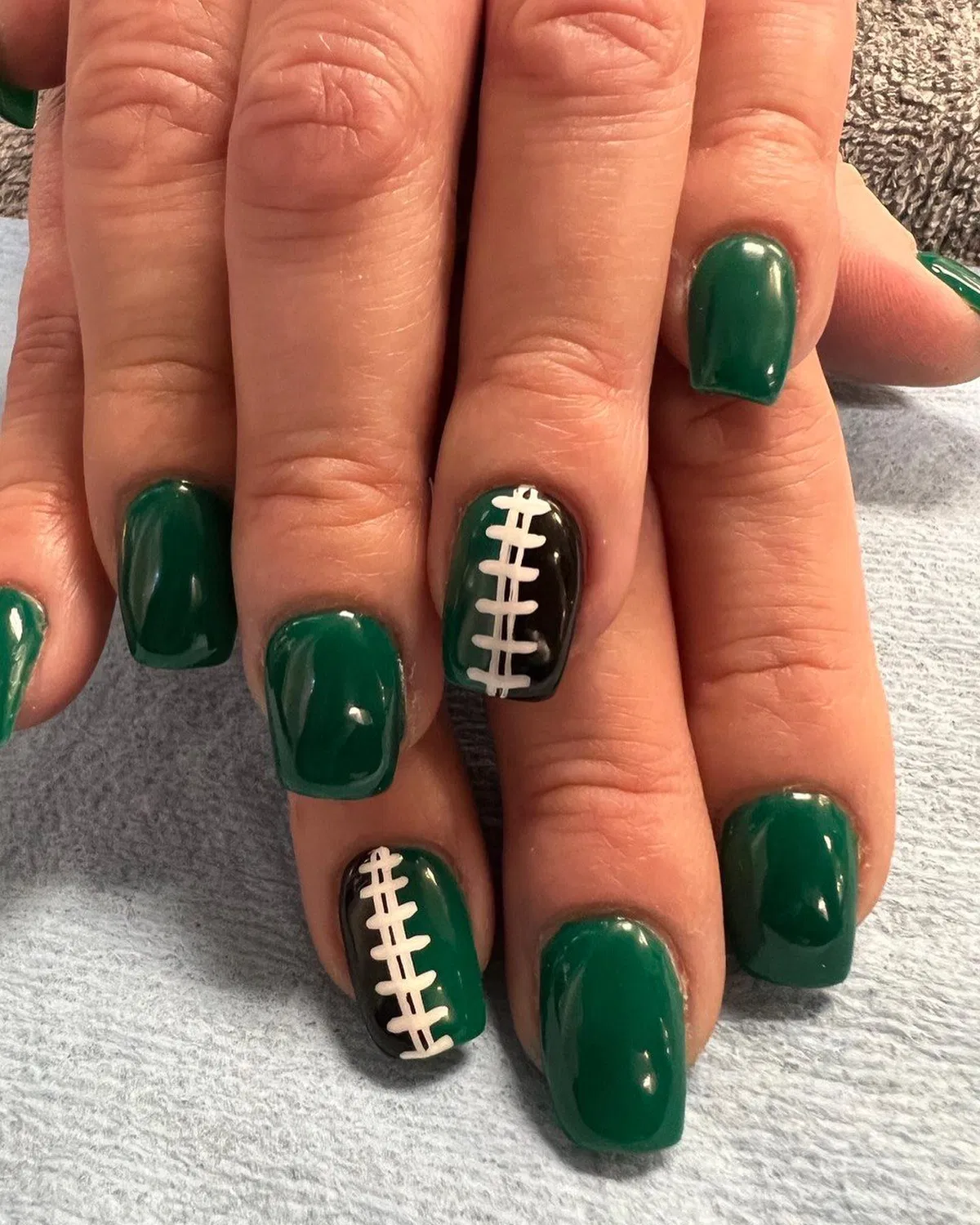 Dark green solids with lace-style accent nails