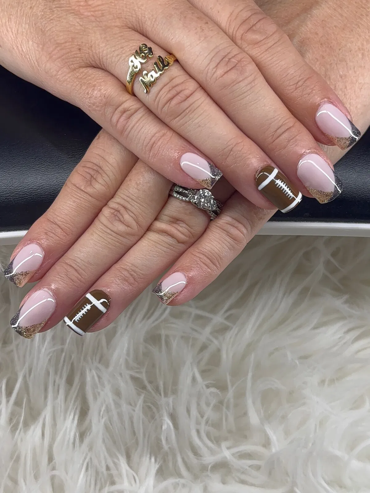 Neutral glitter French tips with brown lace accents