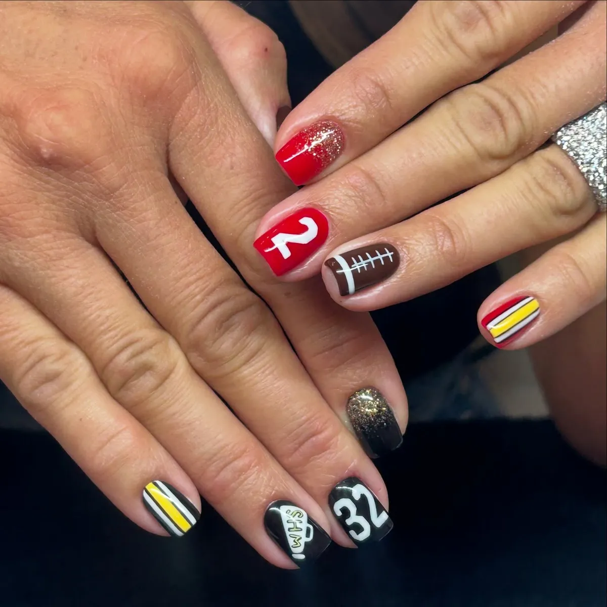 Mixed number nails with football icon and bold stripes