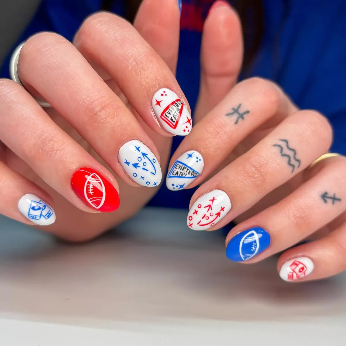 Play-diagram nails with outlined football icons