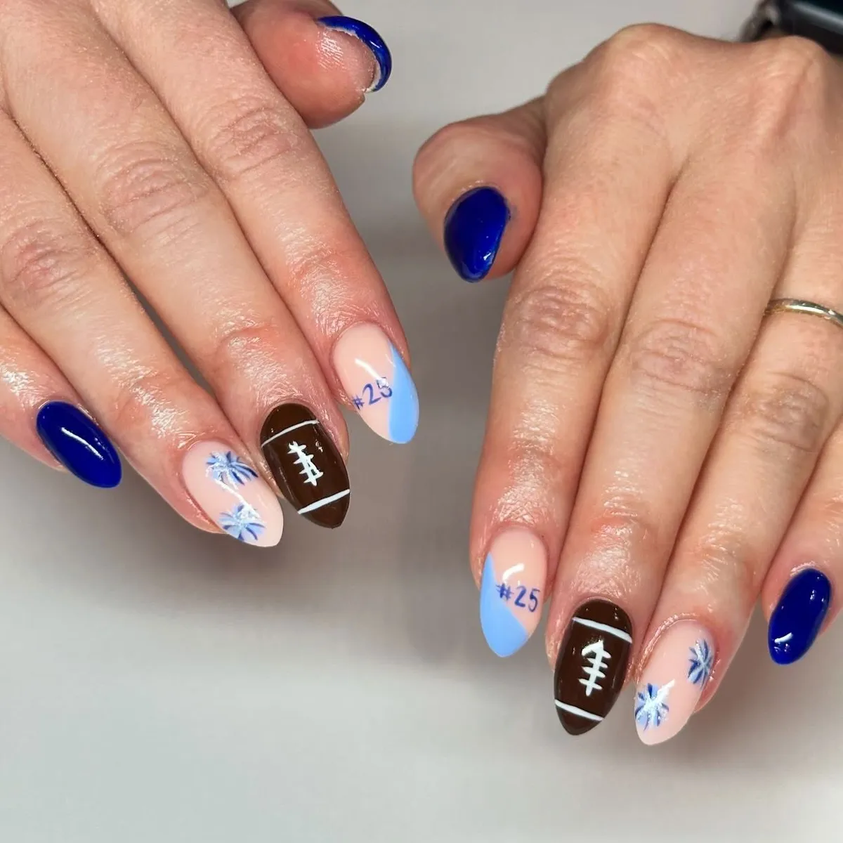 Blue color-block set with football icons and “#” numbers